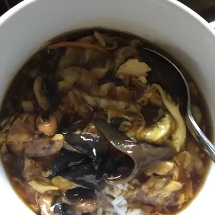 Hot sour soup over rice.
