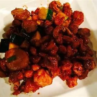 a plate of chicken and vegetables