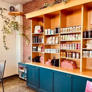a coffee shop with shelves of coffee