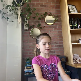 My daughter pretending to make us a few lattes