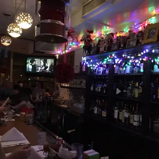 people sitting at a bar