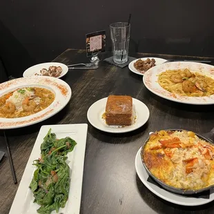 Two etoufees, one with rice and the other with pasta. Sauté spinach, honey butter corn bread and seafood mac. The mac was great.