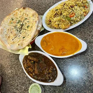 Garlic Naan Chicken Tikka Masala Prawn Biryani Goat Curry