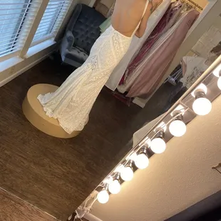 She did the Bustle here- connecting my long train to my dress for easier walking!