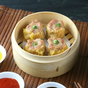 Chicken Dumpling. Chicken siu mai dipping with chili oil, hot mustard sauce. Yummy