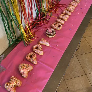 a row of donuts on a table