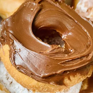 a chocolate frosted donut