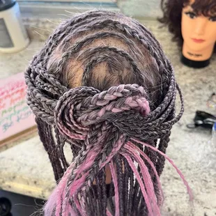 mannequin head with braids.