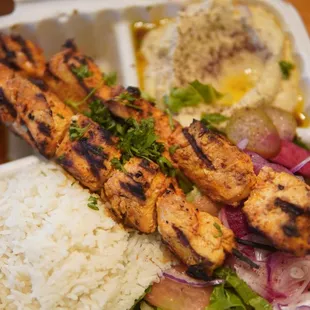 chicken skewers and rice