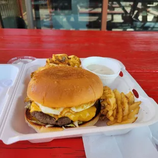 Hangover burger with jalapenos added and a side of waffle fries w/gravy