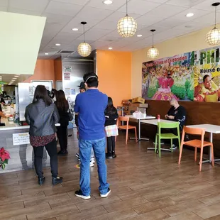 a group of people in a restaurant