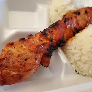 chicken and rice in a styrofoam container