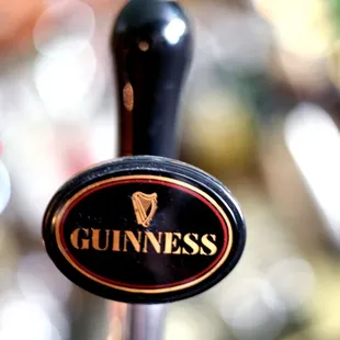 a close up of a beer tap