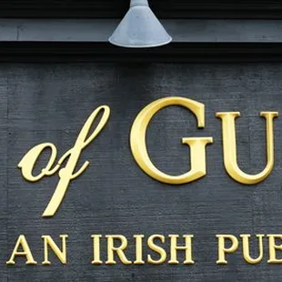 a sign for an irish pub