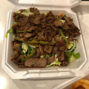 a takeout box of food