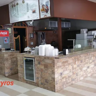 a restaurant with a checkered floor