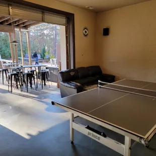 Play some ping pong while enjoying a beer and outdoor patio