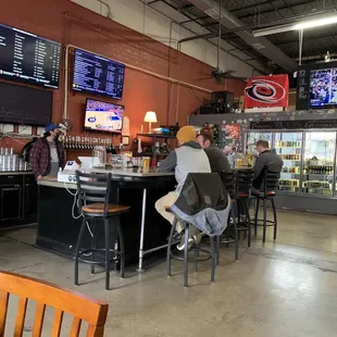 people sitting at the bar