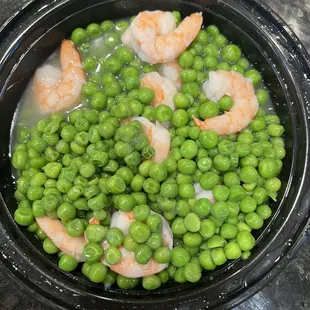 Mushy inedible shrimp with no sauce and instead of snow peas - we received a bowl of green peas.