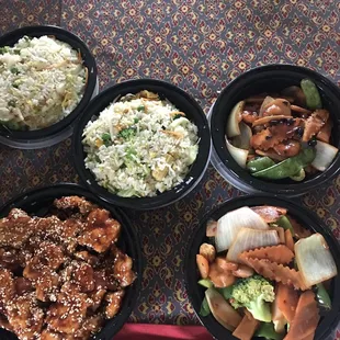 four bowls of food on a table