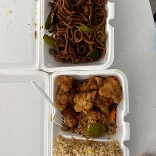 three takeout containers of food