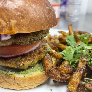 a burger and fries on a plate