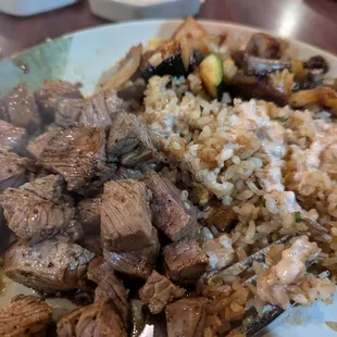 Filet, fried rice and veggies