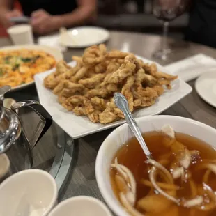 Tang-Su-Yuk (pork) w/ steam rice and Mapa Tofu in the background.   Really good!