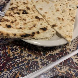 two flatbreads on a plate