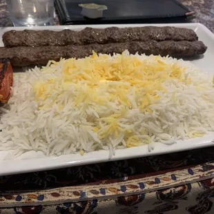 a plate of rice and meat
