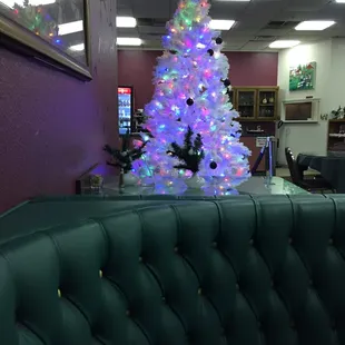 a christmas tree in the corner