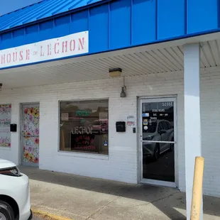 a car parked in front of a building