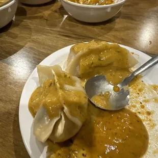 Momo with mild spicy sauce