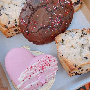 Scones (chocolate chip, lemon blueberry); brownie cookie; Valentine&apos;s Day large macaron