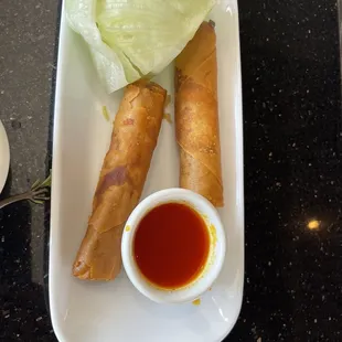 Egg rolls with red vinegar dip yuck