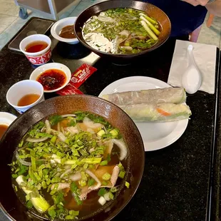 Pho with extra veggies and onion oil and grilled pork salad rolls. Decent portions