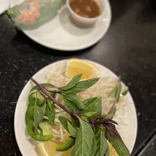 a plate of food with shrimp and vegetables