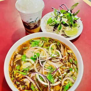 a bowl of soup and a salad