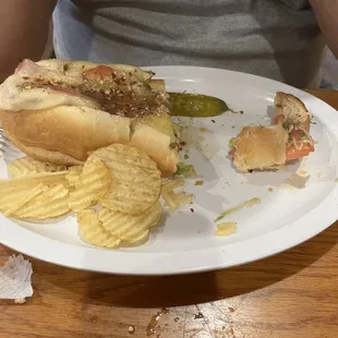 My husband's Italian sub half eaten.