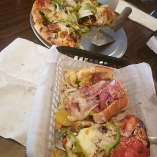 Hot pastrami sub and House pizza