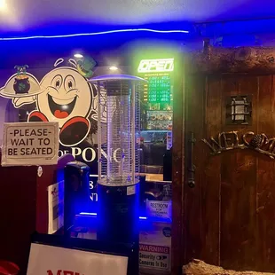 Outside - has tavern looking entrance with mascot, can scan QR code for menu
