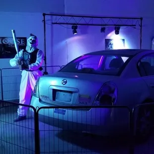 Customer getting ready to smash a car