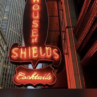 a neon sign for a restaurant