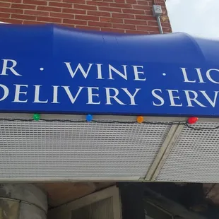 a sign for a liquor delivery service