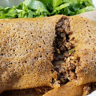 Kitfo wrap. It's an appetizer but functions equally well as a normal entree.