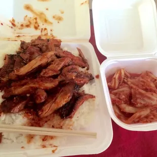Spicy chicken #4 of spiciness. With a side of kimchi. Total $8 and some change