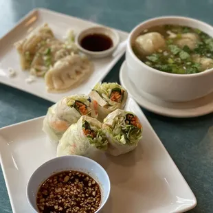 a plate of food and a bowl of soup