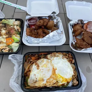 Pad woon sen, shrimp tempura, soft shell crab, and Thai basil chicken and egg over rice