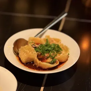 Wontons that were flavored well but not super tender.