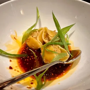 Shrimp and pork shumai in hot chili sauce